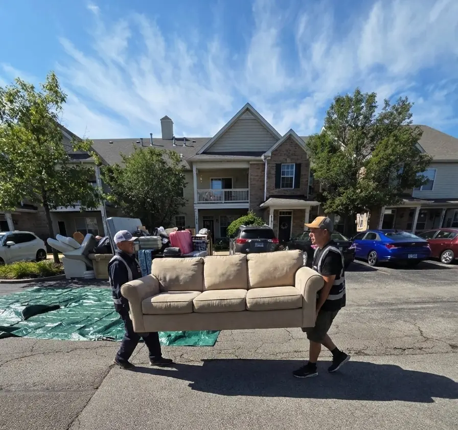 Workers removing furniture